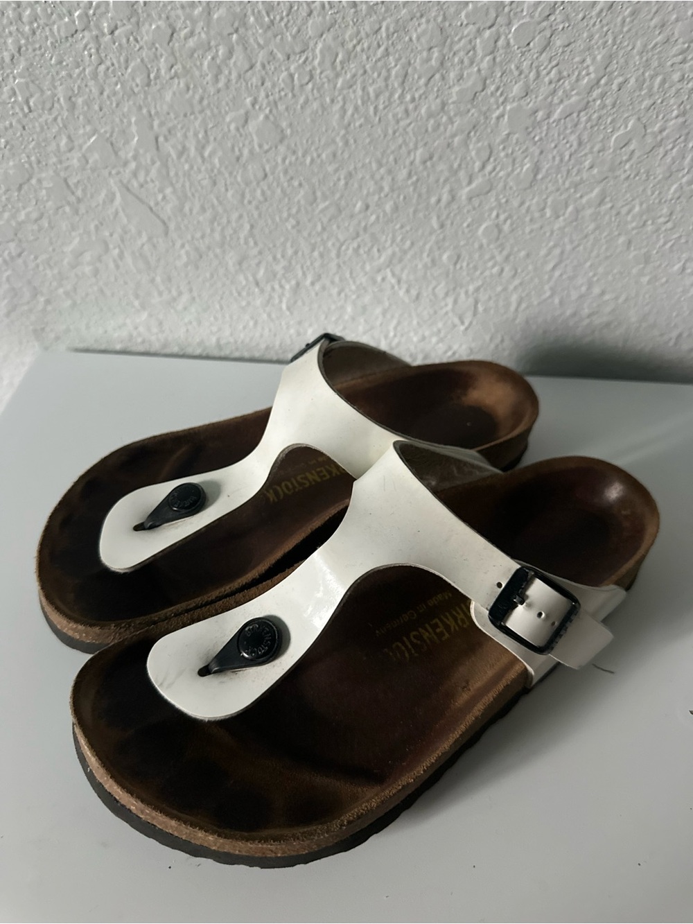 Birkenstock // White Leather Gizeh Style Sandal with Black Buckle